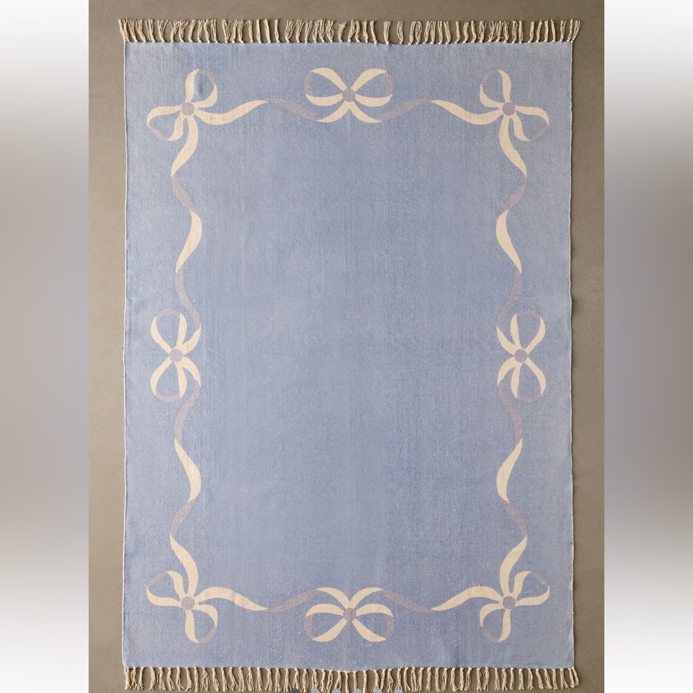 Urban Outfitters Lacey Bows Unbrushed Printed Rug
( Blue 3’ x 5’. NWT